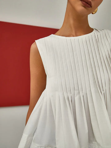 Pleated Peplum Sleeveless Blouse Pleated Peplum Sleeveless Blouse