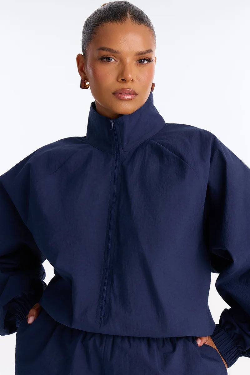 On The Move Windbreaker Long Sleeve Romper