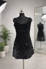 Black mini dress with embellishments
