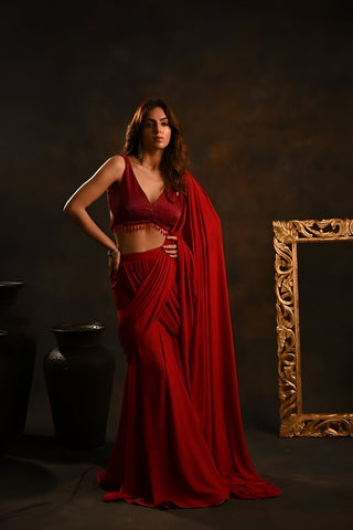 Red pre-drape saree with embellished blouse